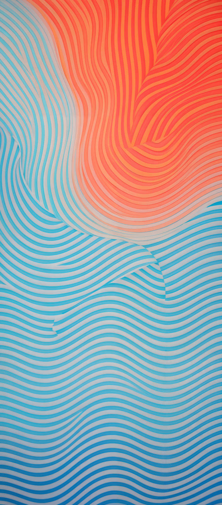 The image showcases a vibrant and intricate pattern of wavy lines. The dominant colors are varying shades of blue and orange. The blue lines form a dense, almost solid pattern at the bottom, while the orange lines create a more fluid and wavy pattern that ascends towards the top. The interplay of these colors and patterns gives the image a dynamic and rhythmic feel.