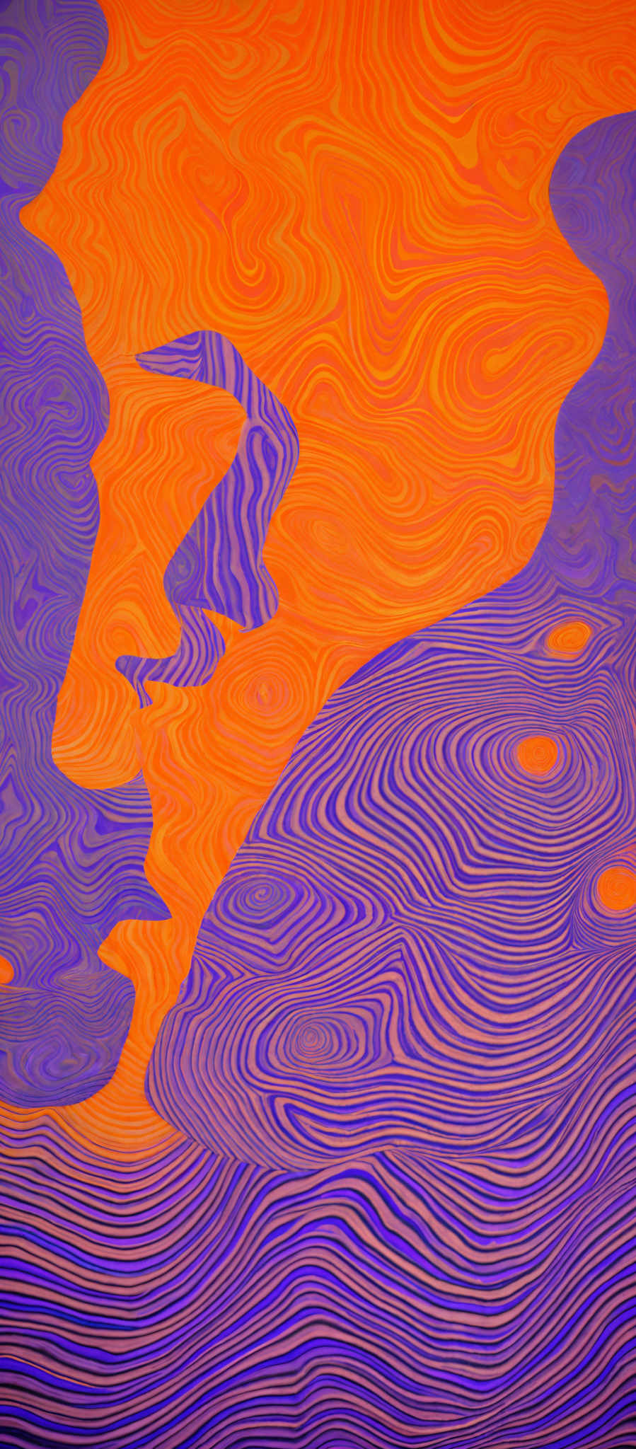 The image showcases a vibrant and intricate pattern with a combination of blue and orange hues. The pattern consists of swirling and wavy lines that create a sense of movement and fluidity. The blue patterns resemble water or waves, while the orange patterns give a feeling of heat or fire. There are also abstract shapes, such as a crescent moon and a few circular patterns, interspersed within the main design.