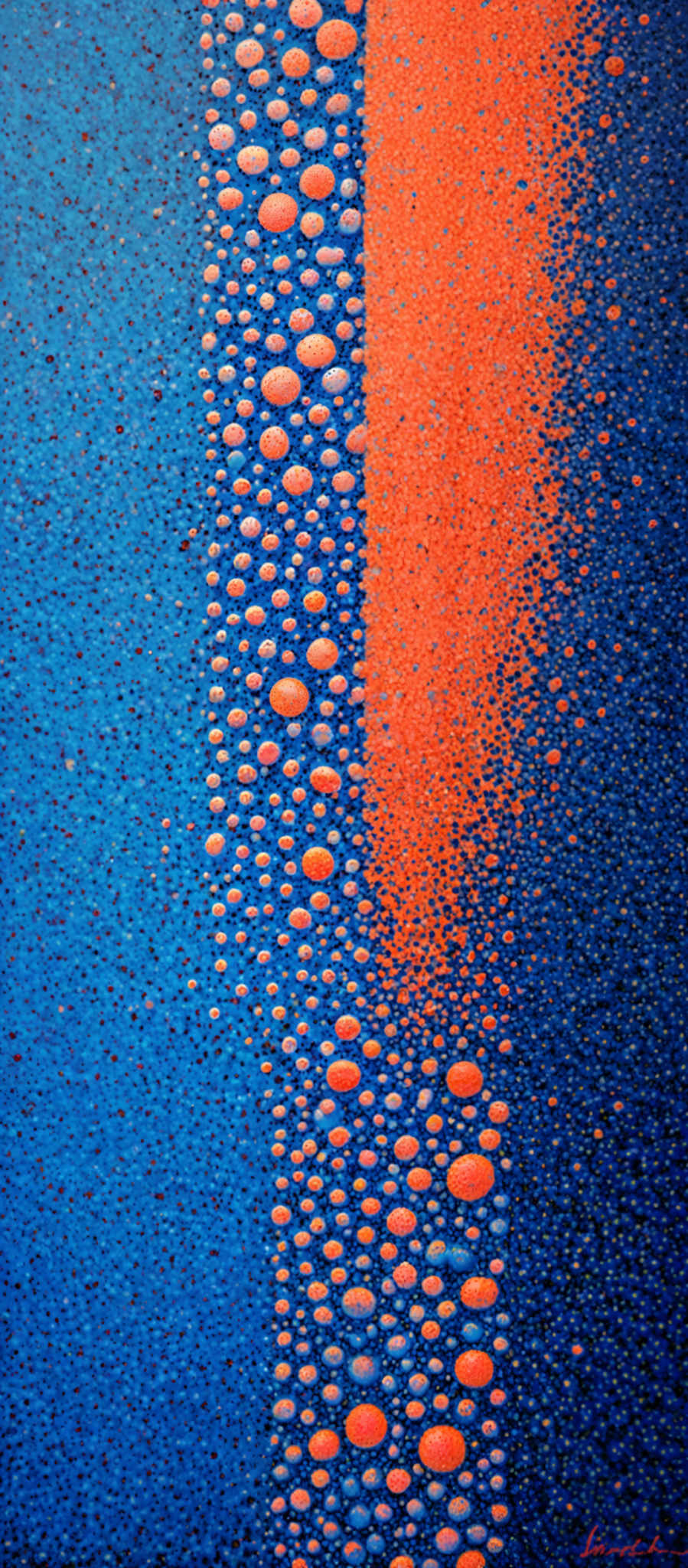 The image predominantly features two colors: a deep blue and a vibrant orange. The blue forms the background, while the orange forms a vertical stripe in the center. The background is speckled with numerous small, round, and irregularly shaped dots, giving it a textured appearance. The orange stripe is dotted with larger, more uniform circles, creating a contrast between the two colors.