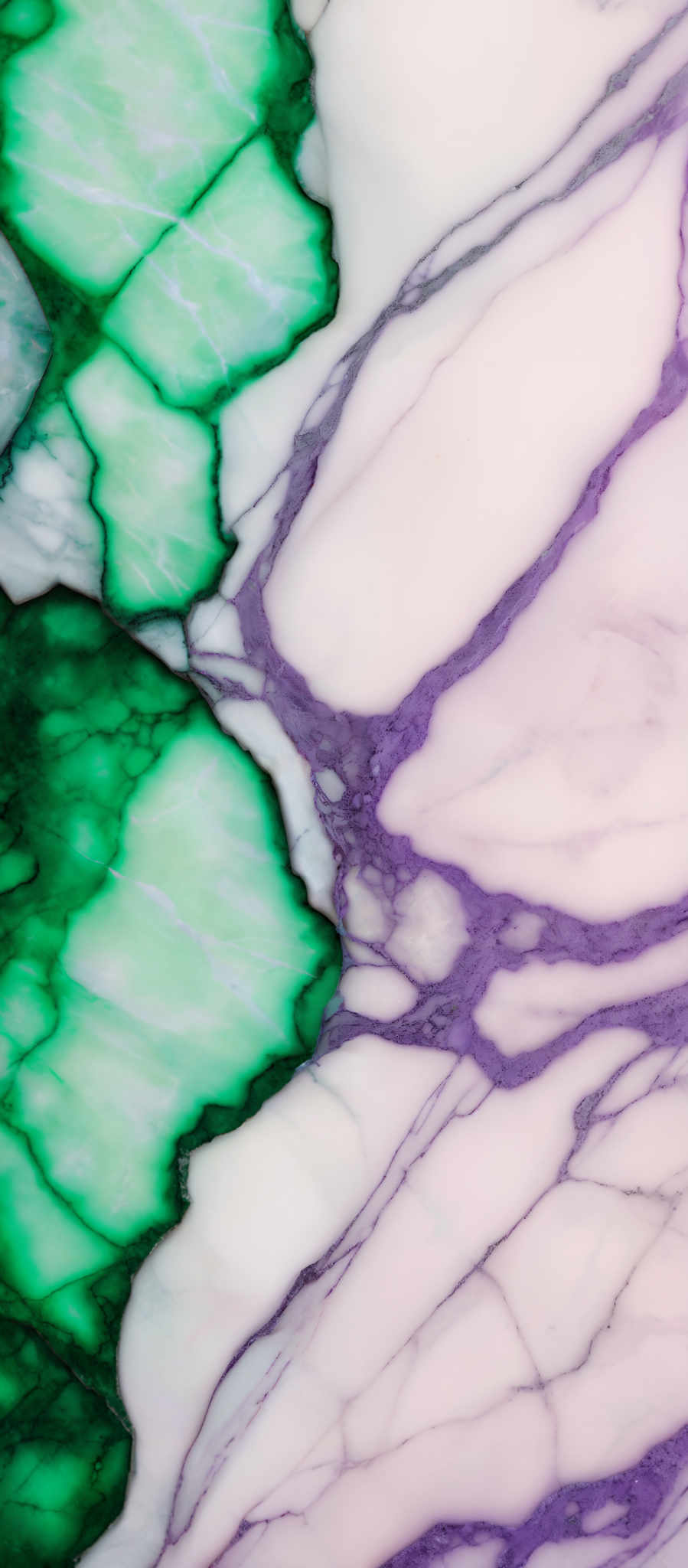 The image showcases a marbled pattern with a combination of green, white, and purple hues. The green is predominantly in the form of intricate, almost organic shapes that resemble cells or geode formations. These green shapes are interspersed with white and purplish veins, creating a contrasting and visually appealing design.