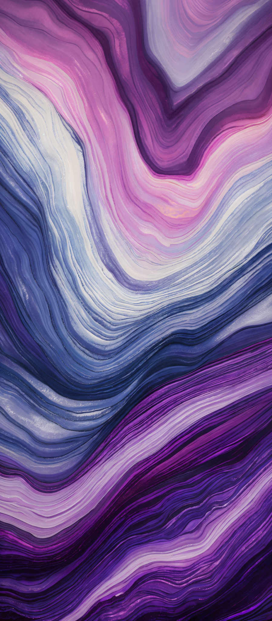 The image showcases a vibrant and intricate pattern of swirling colors. The dominant colors are shades of purple, pink, and blue. The swirls are layered and appear to flow seamlessly, creating a marbled or fluid effect. The shapes resemble waves or ripples, giving the image a dynamic and fluid appearance.