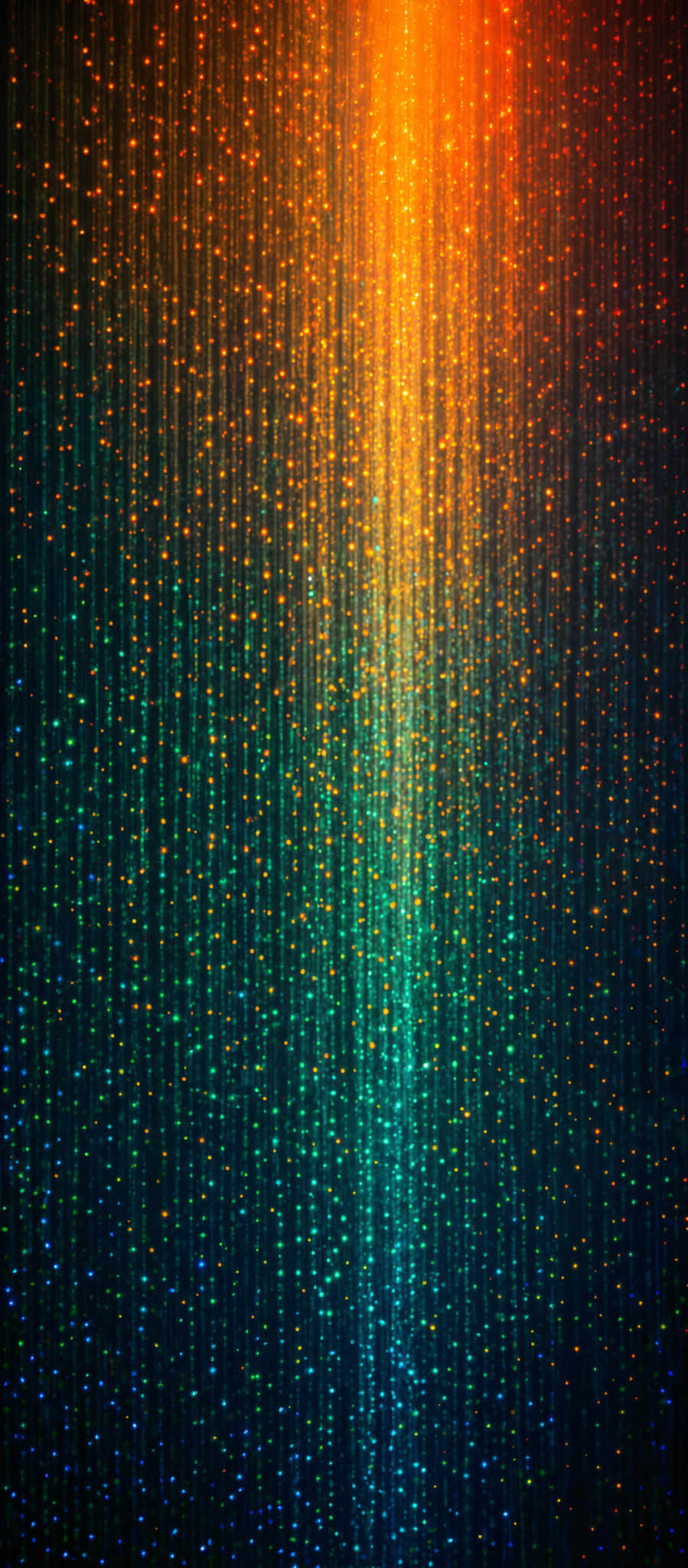 The image showcases a vibrant and colorful display of vertical lines, each adorned with small, glowing particles. The colors transition from a deep blue at the top to a radiant orange at the bottom. The glow from the particles creates a shimmering effect, giving the image a dynamic and lively appearance.