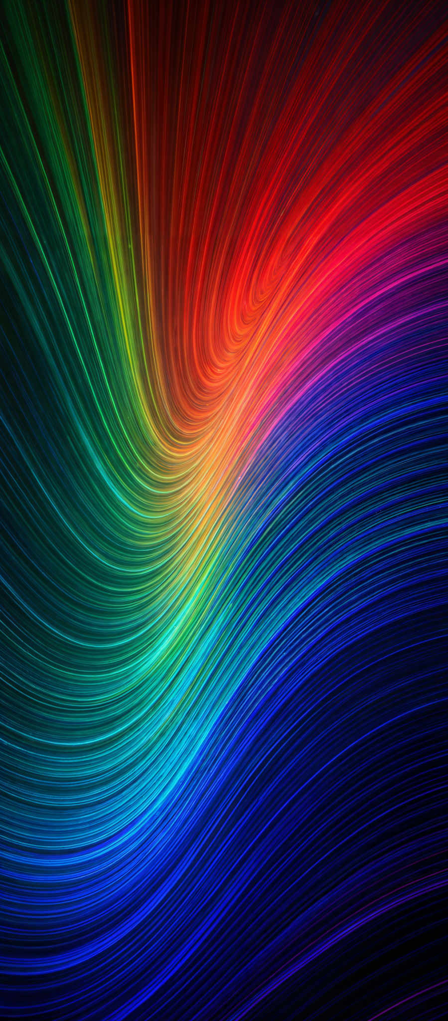 The image showcases a vibrant and dynamic swirl of colors. The colors range from deep blues at the bottom to bright reds at the top. The swirls are fluid and curvy, giving the image a sense of movement and energy. The overall shape resembles a spiral or vortex, drawing the viewer's eye inwards towards the center.