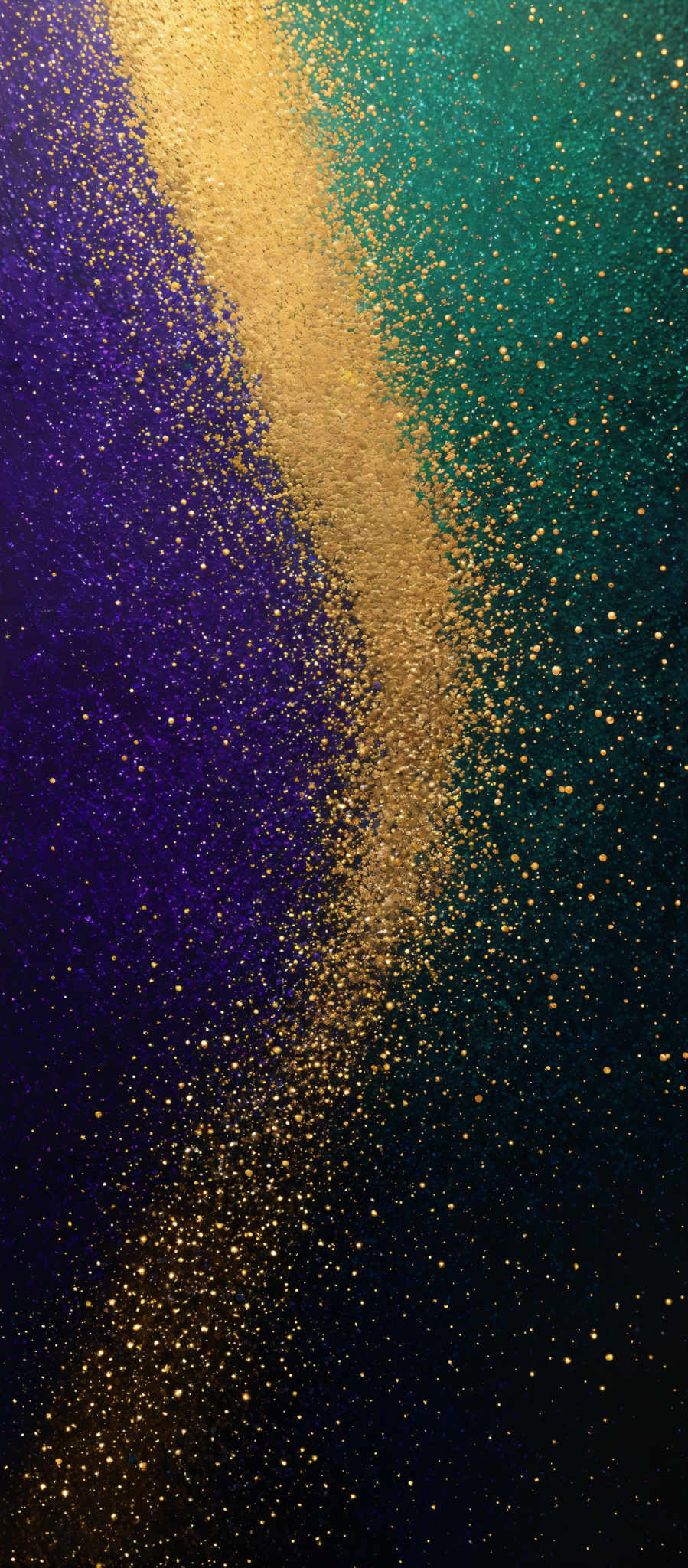 The image showcases a vibrant and captivating blend of colors. It predominantly features shades of purple, teal, and gold. The purple and teal form a gradient, transitioning smoothly from one hue to the other, creating a sense of depth. The gold, on the other hand, forms a diagonal streak that cuts across the gradient, adding a touch of luxury and contrast. The entire composition is speckled with numerous tiny gold specks, giving it a sparkling and glittery appearance.