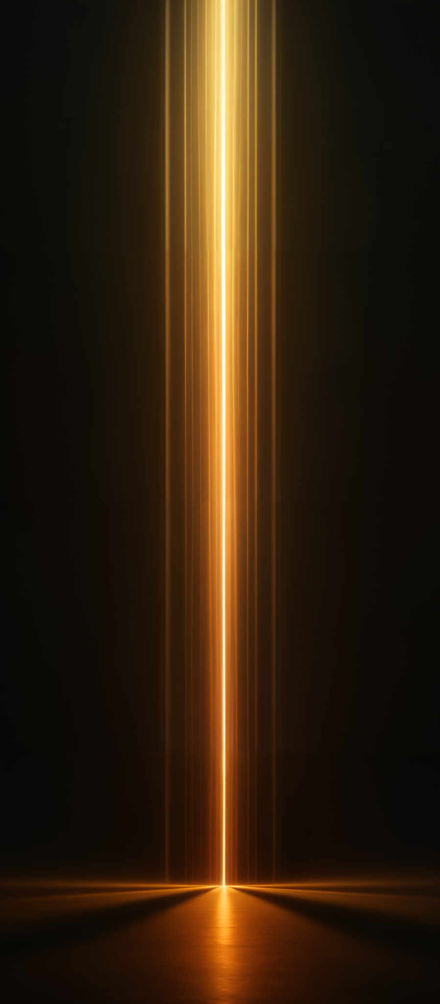 The image predominantly features a deep black background with a vertical golden light beam that appears to be emanating from the center. The beam is bright and radiant, contrasting sharply with the surrounding darkness. At the base of the beam, there's a reflection on the ground, creating a symmetrical visual effect. The overall ambiance of the image is mysterious and ethereal.