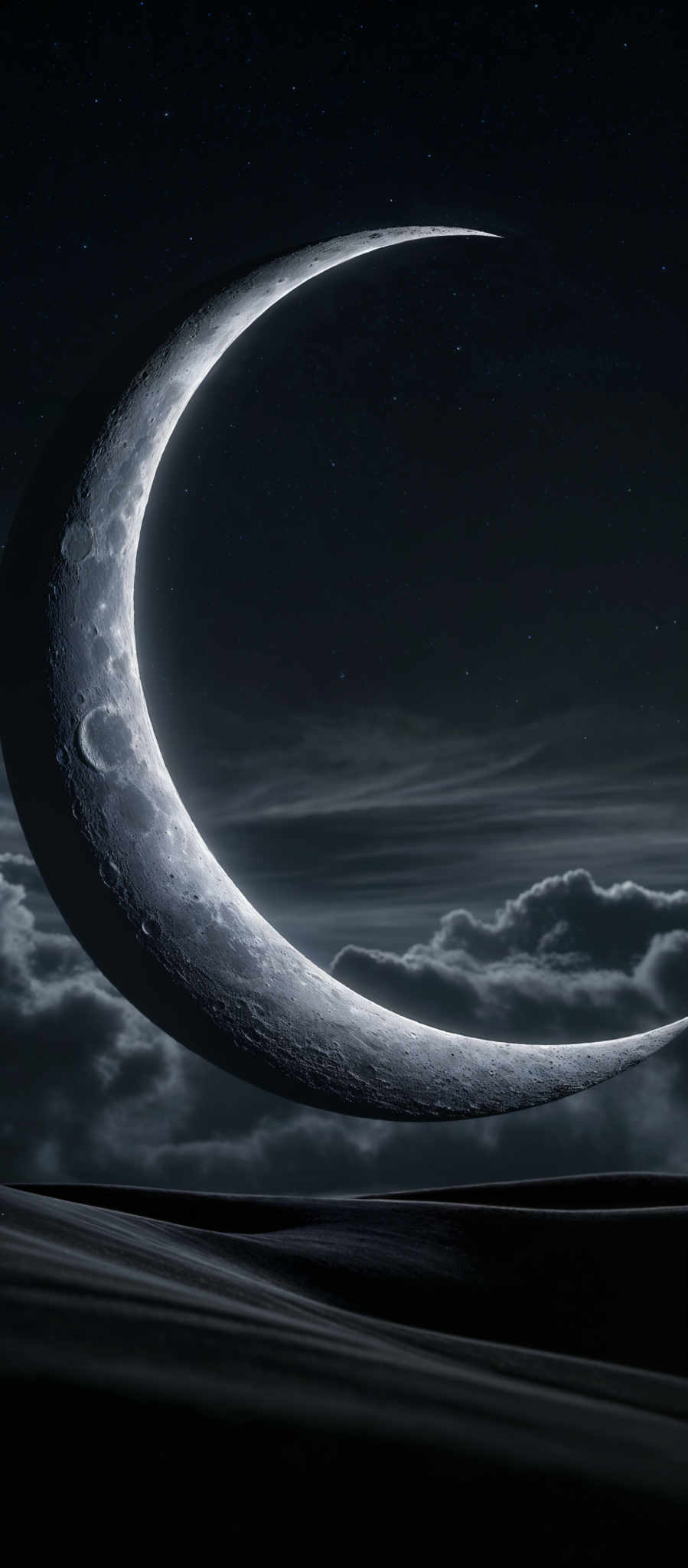 The image showcases a mesmerizing night sky with a prominent crescent moon. The moon appears to be highly detailed, displaying craters and textures typical of celestial bodies. The sky is dotted with numerous stars, creating a serene and vast atmosphere. Below the moon, there's a landscape with rolling hills or dunes, which are illuminated, possibly by the moon's light. The overall color palette is dominated by deep blues and blacks, with the moon and its reflection casting a silvery light on the landscape.