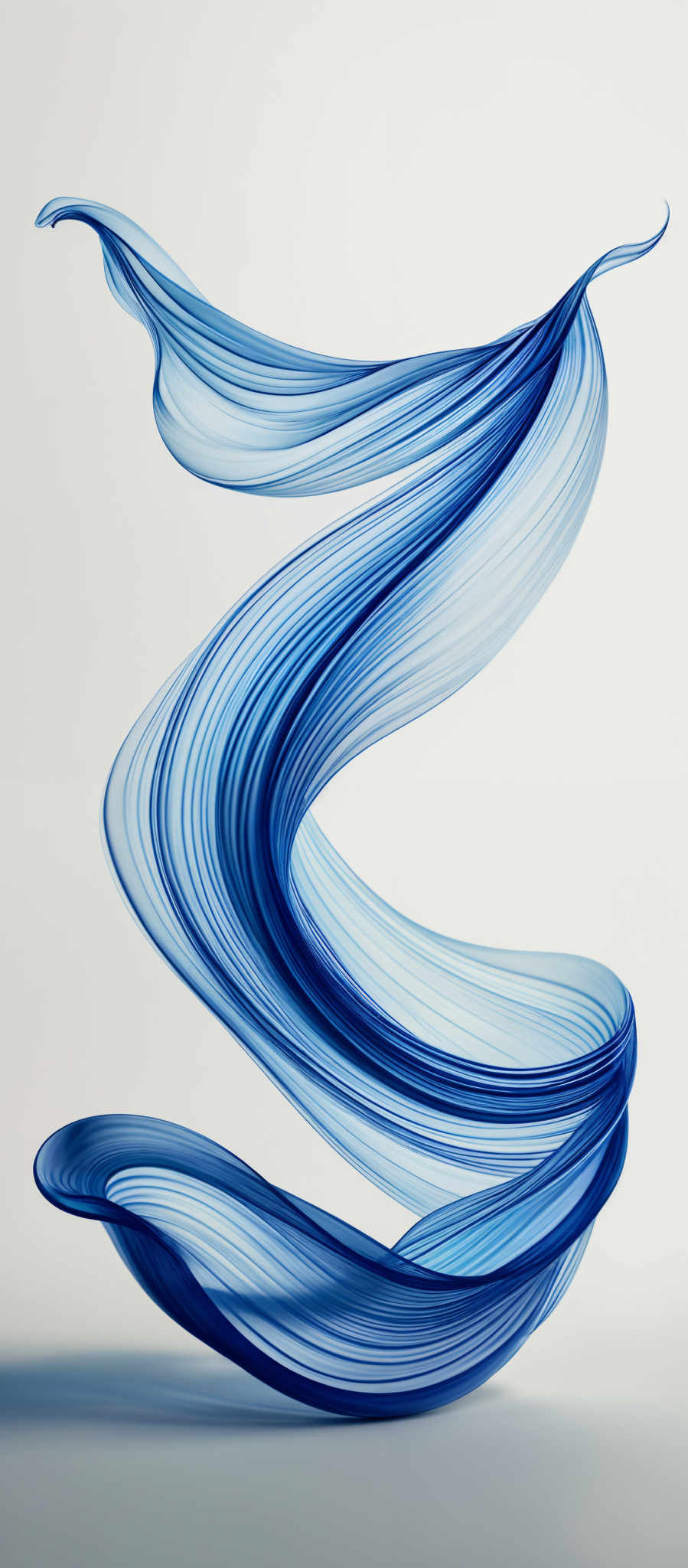 The image showcases a vibrant and intricate swirling pattern. The dominant color is a shade of blue, ranging from light to dark. The shape is reminiscent of a spiral or helix, with fluid and wavy lines intertwining and overlapping. The swirled pattern appears to be suspended in mid-air, creating a sense of movement and dynamism.