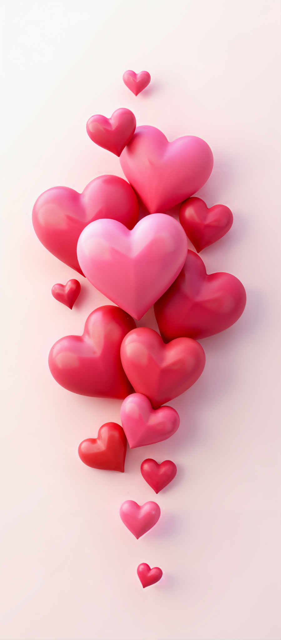 A collection of pink hearts are scattered across a white background.