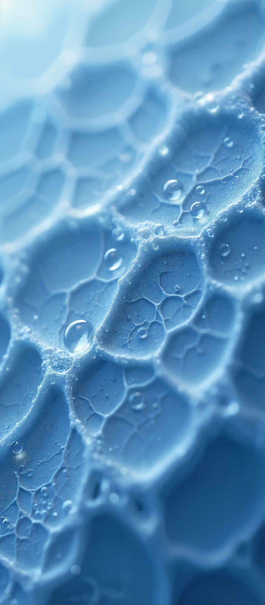 A close up of a blue surface with water droplets on it.