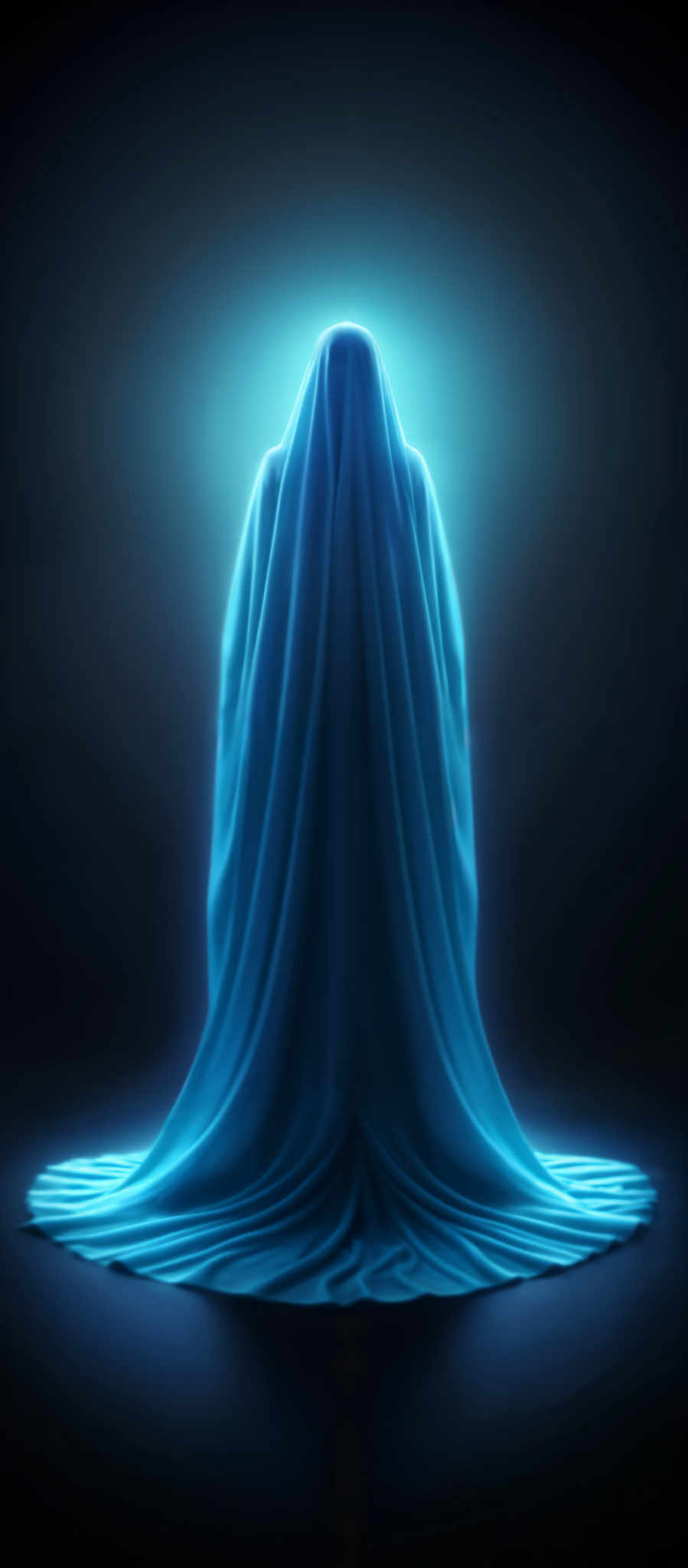 A blue hooded figure stands in a dark blue background. The figure is illuminated by a bright blue light from above casting a shadow on the ground. The hood of the figure is long and flows down to the ground creating a sense of mystery. The body of the hooded person is also covered in a blue material adding to the overall blue theme of the scene. The image is a digital illustration and the colors are vibrant and stand out against the dark background.