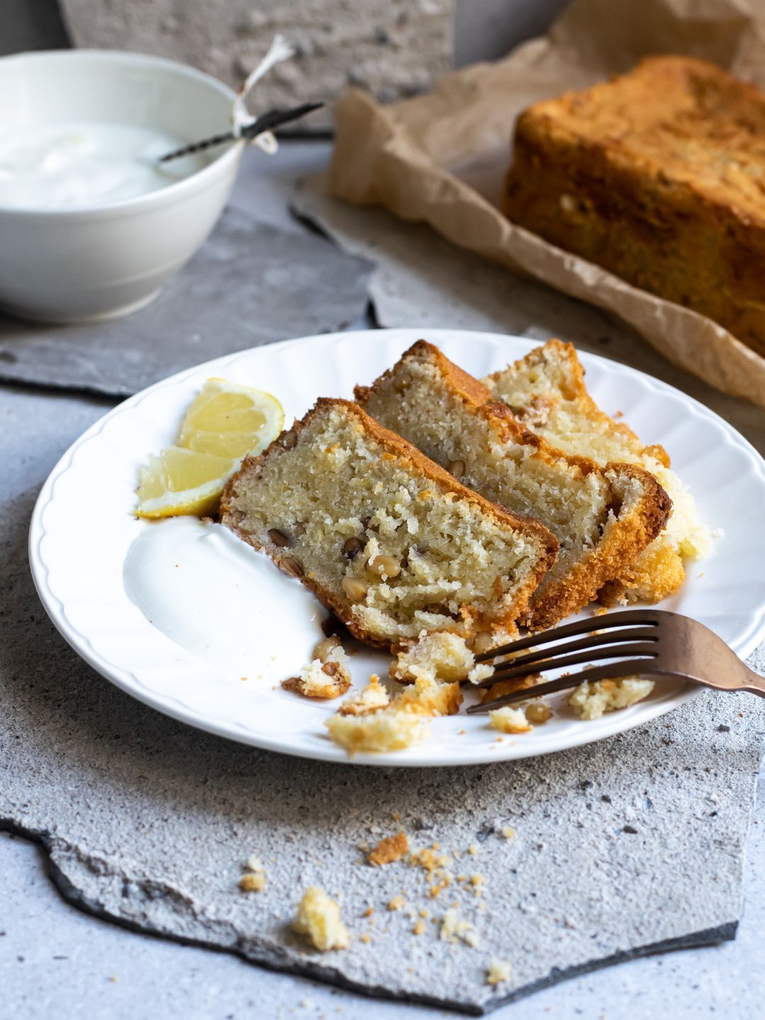 Yogurt cake with lemon and pine nuts