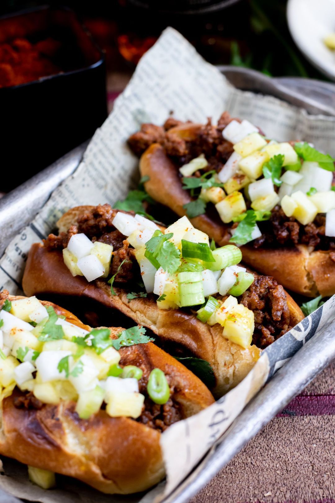 Rum spiced minced meat sandwich with pineapple salsa