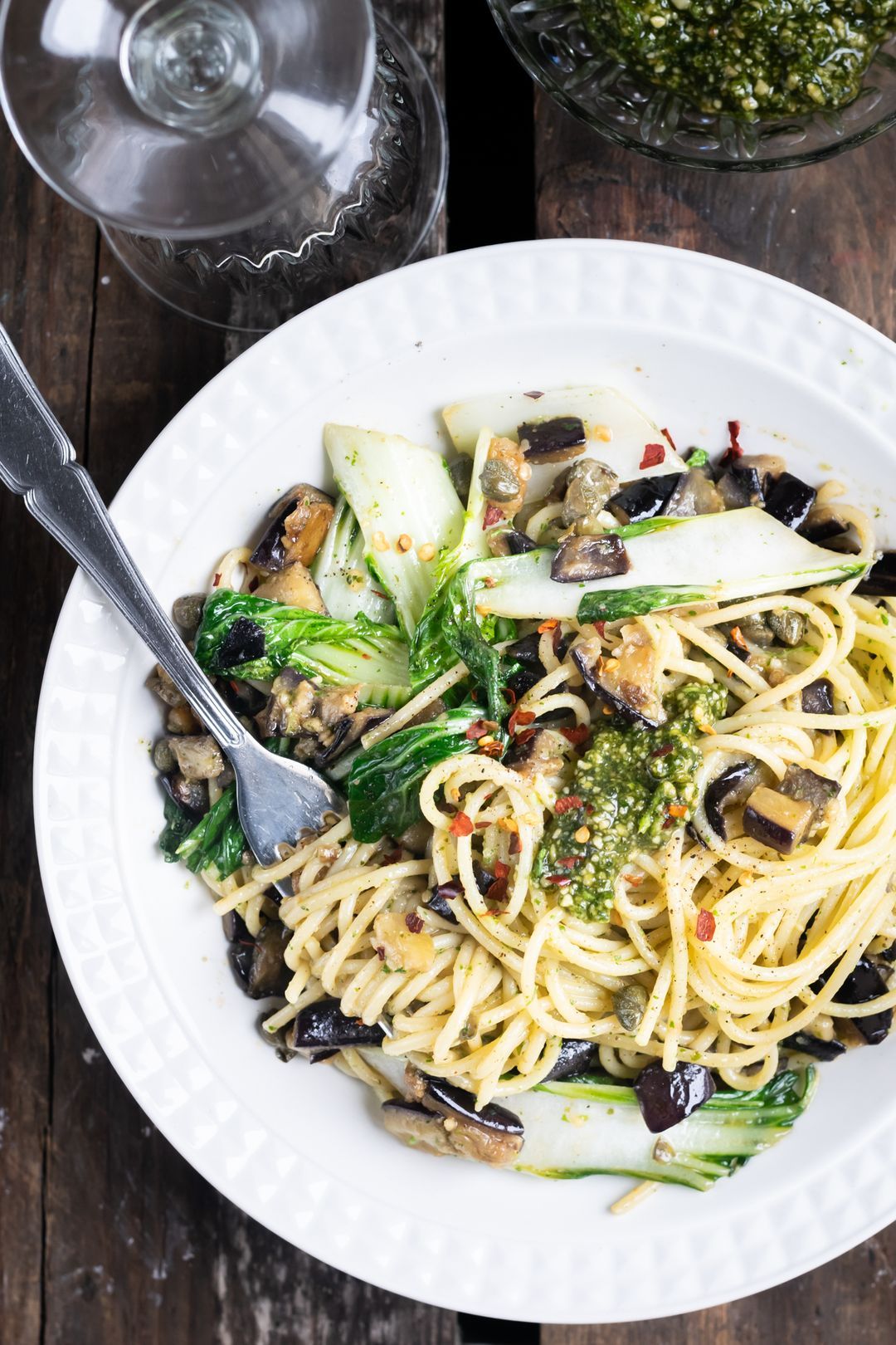 Vegetarian spaghetti with eggplant, pesto and pak choi