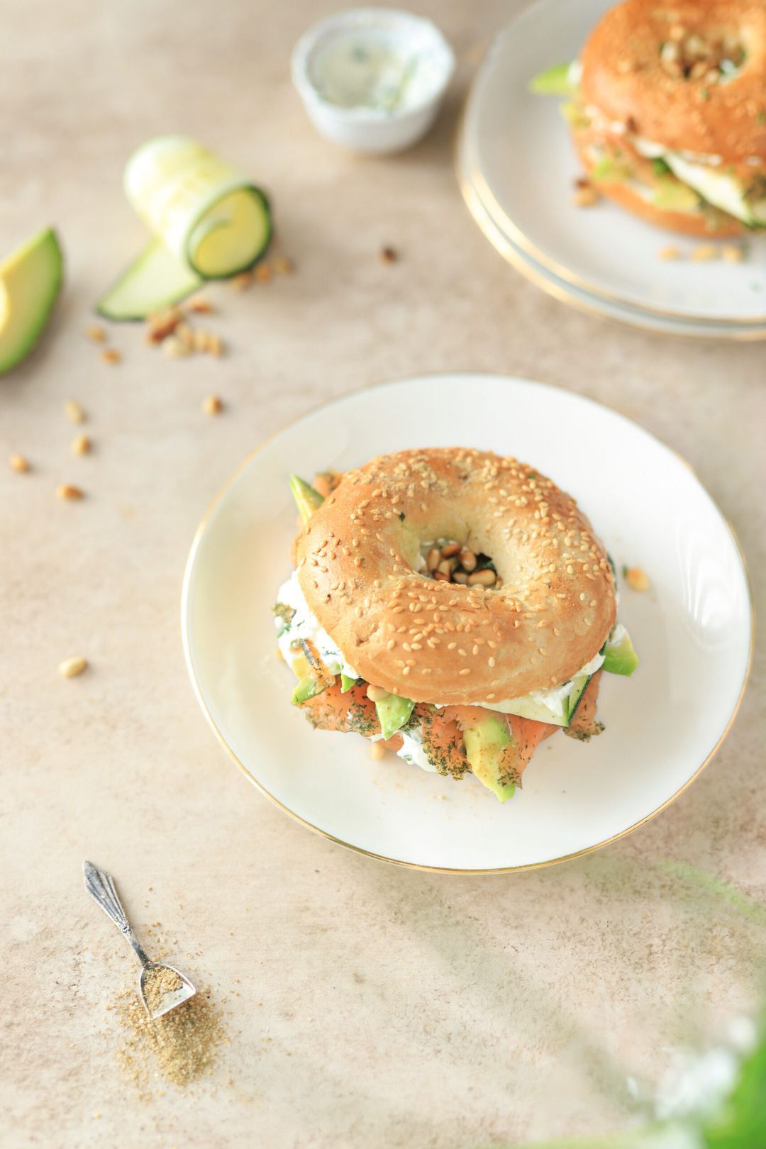 Bagel with salmon, cream cheese, avocado & zucchini