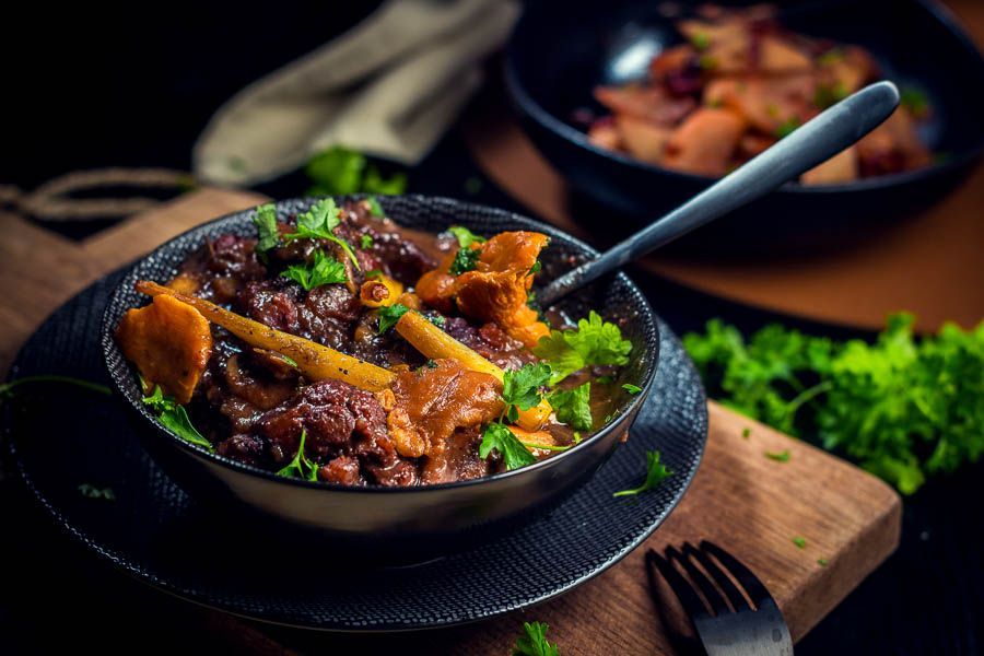 Autumn stew of smoked wild boar with parsnip