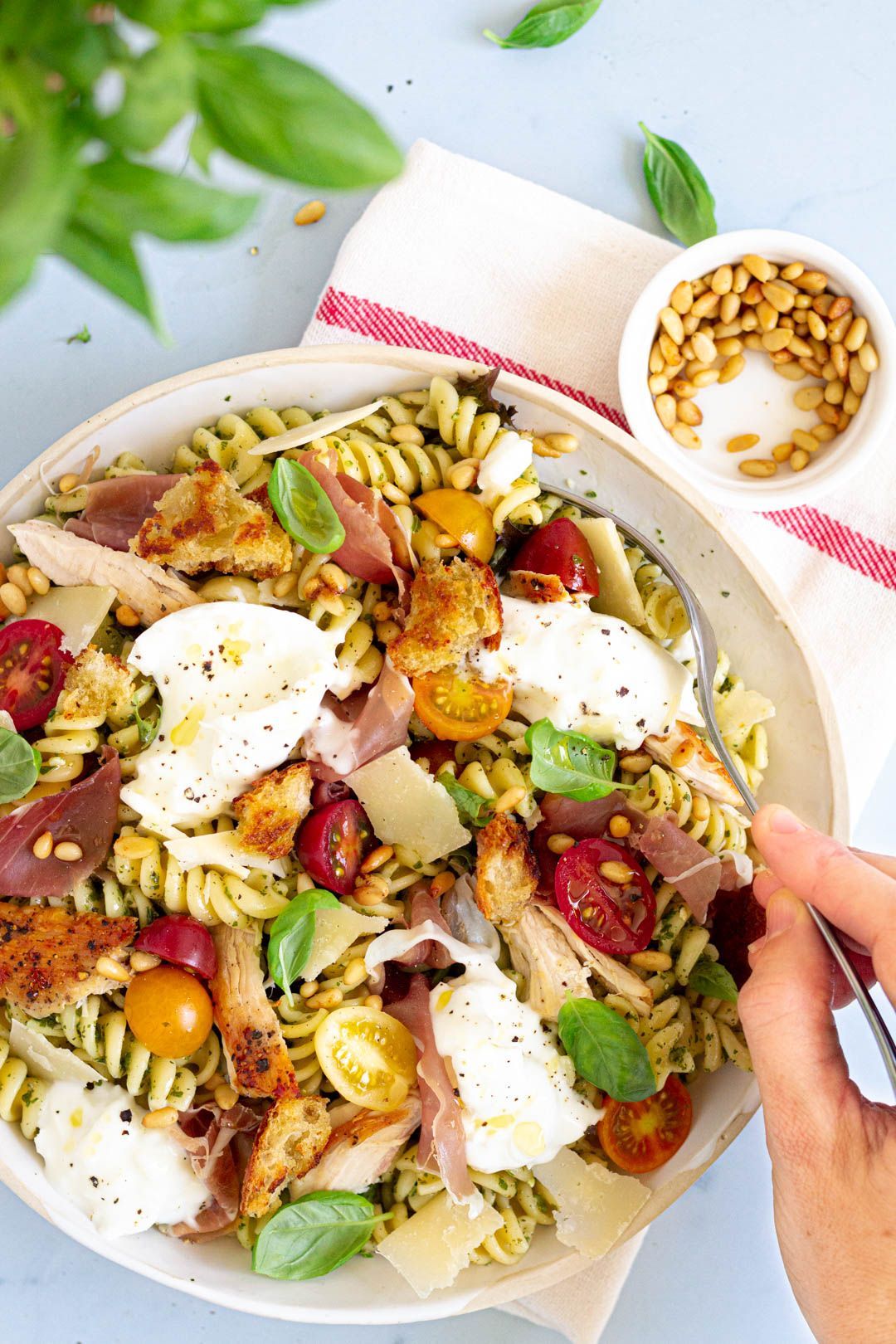 Pasta salad with pesto, chicken and burrata