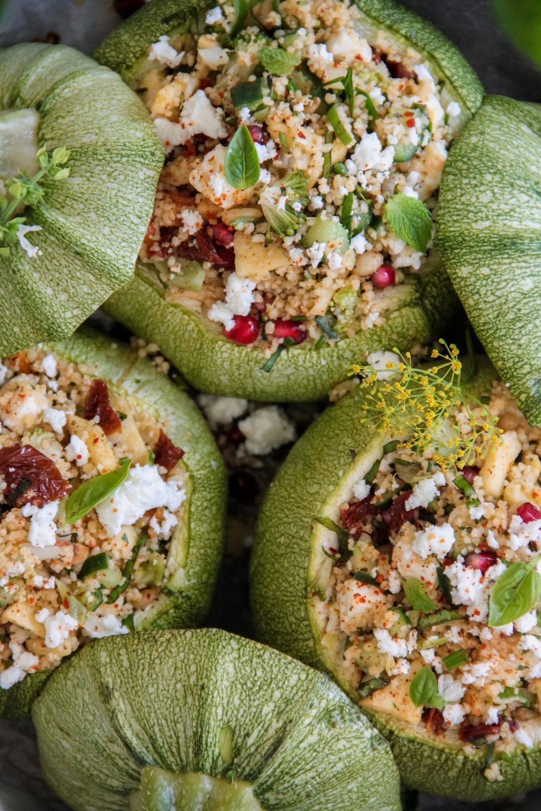 Stuffed courgettes with couscous salad