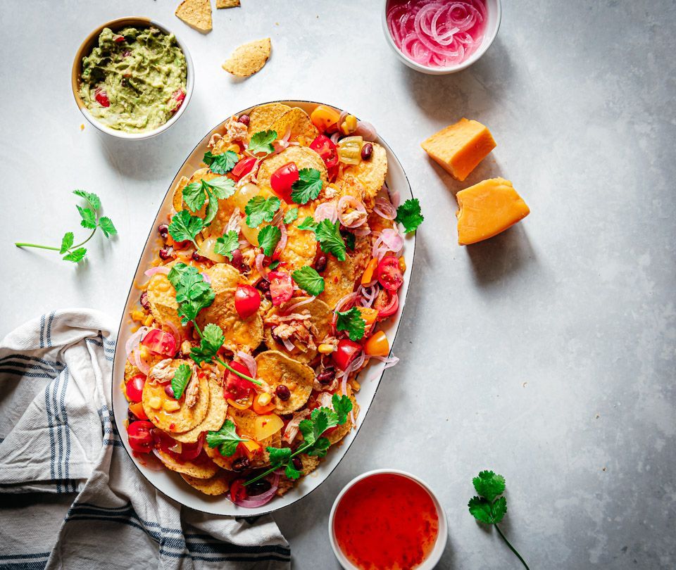 Pulled chicken nachos with chili sauce