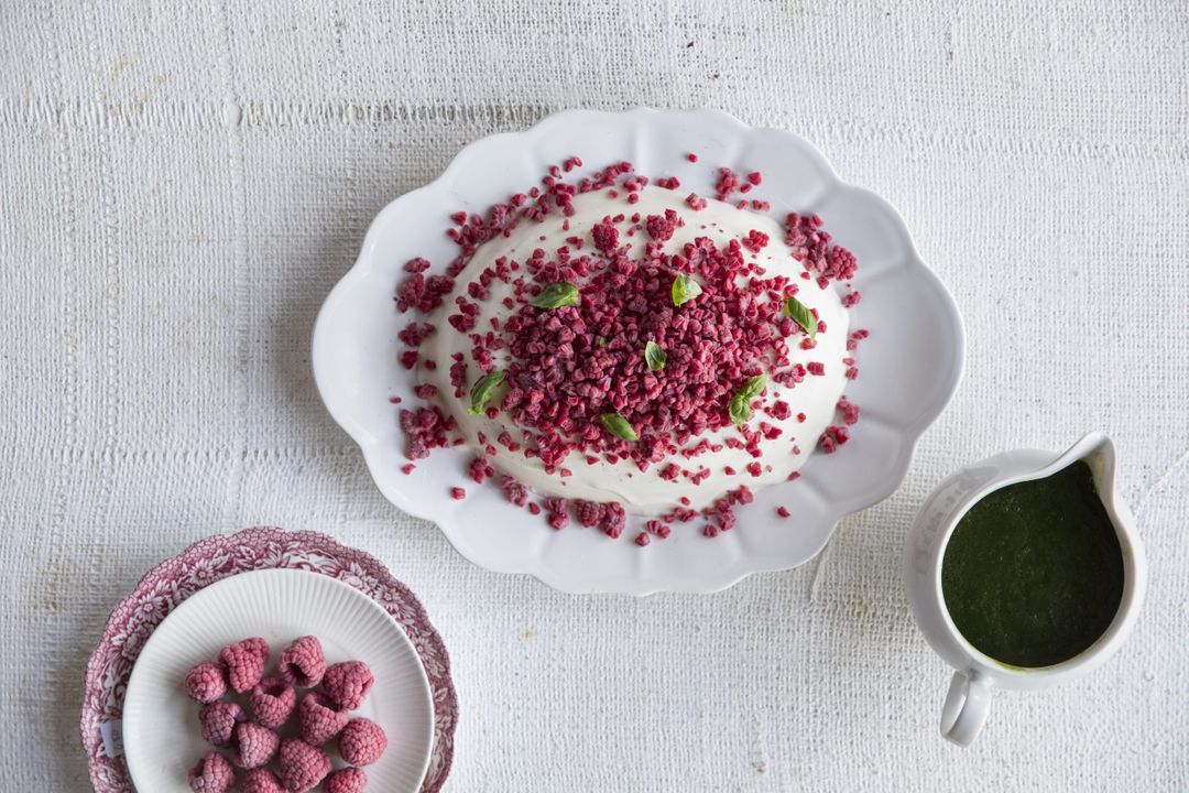 Frozen raspberries with yogurt pudding and basil syrup