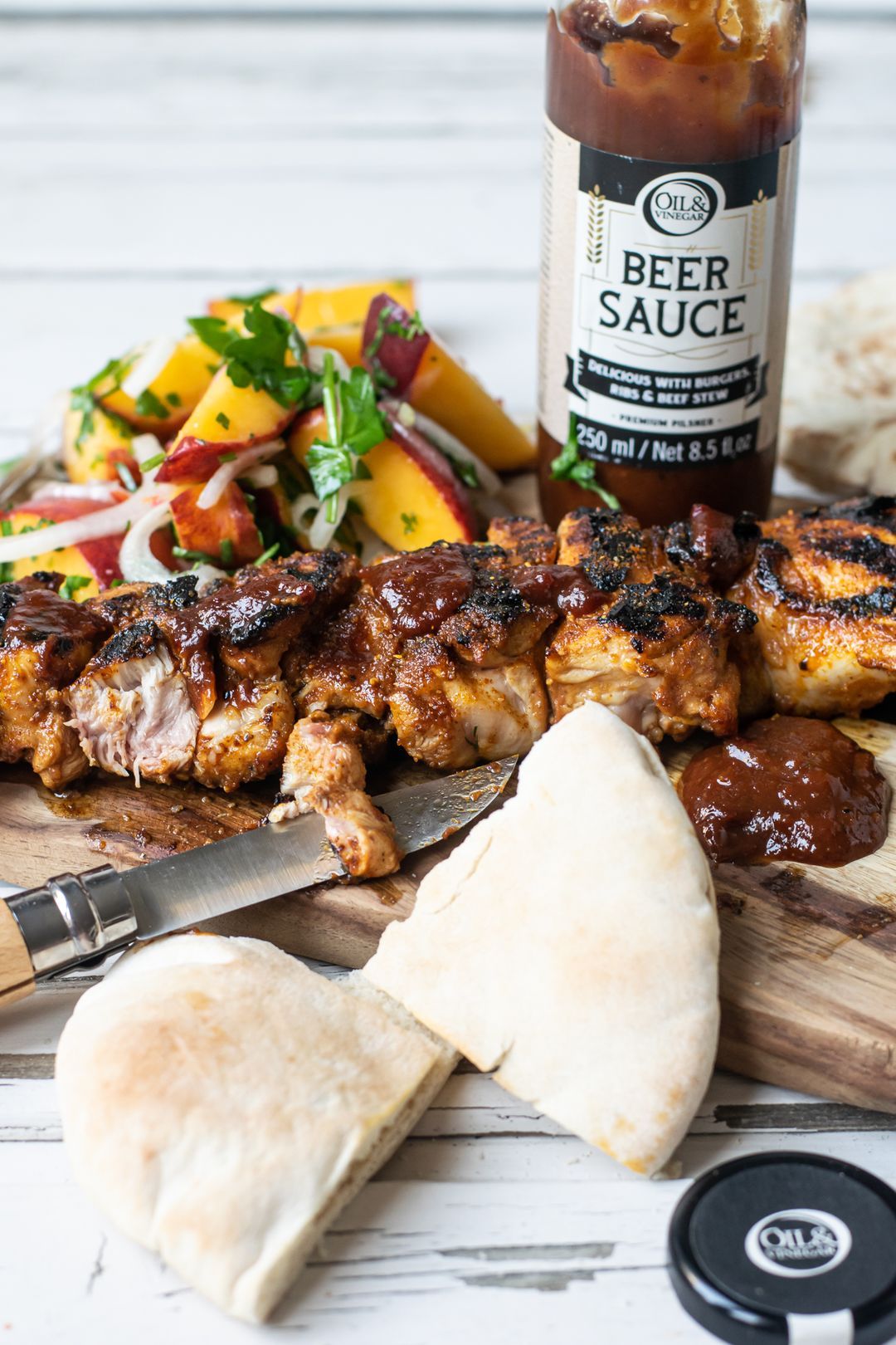 Chicken skewer with beer sauce and peach
