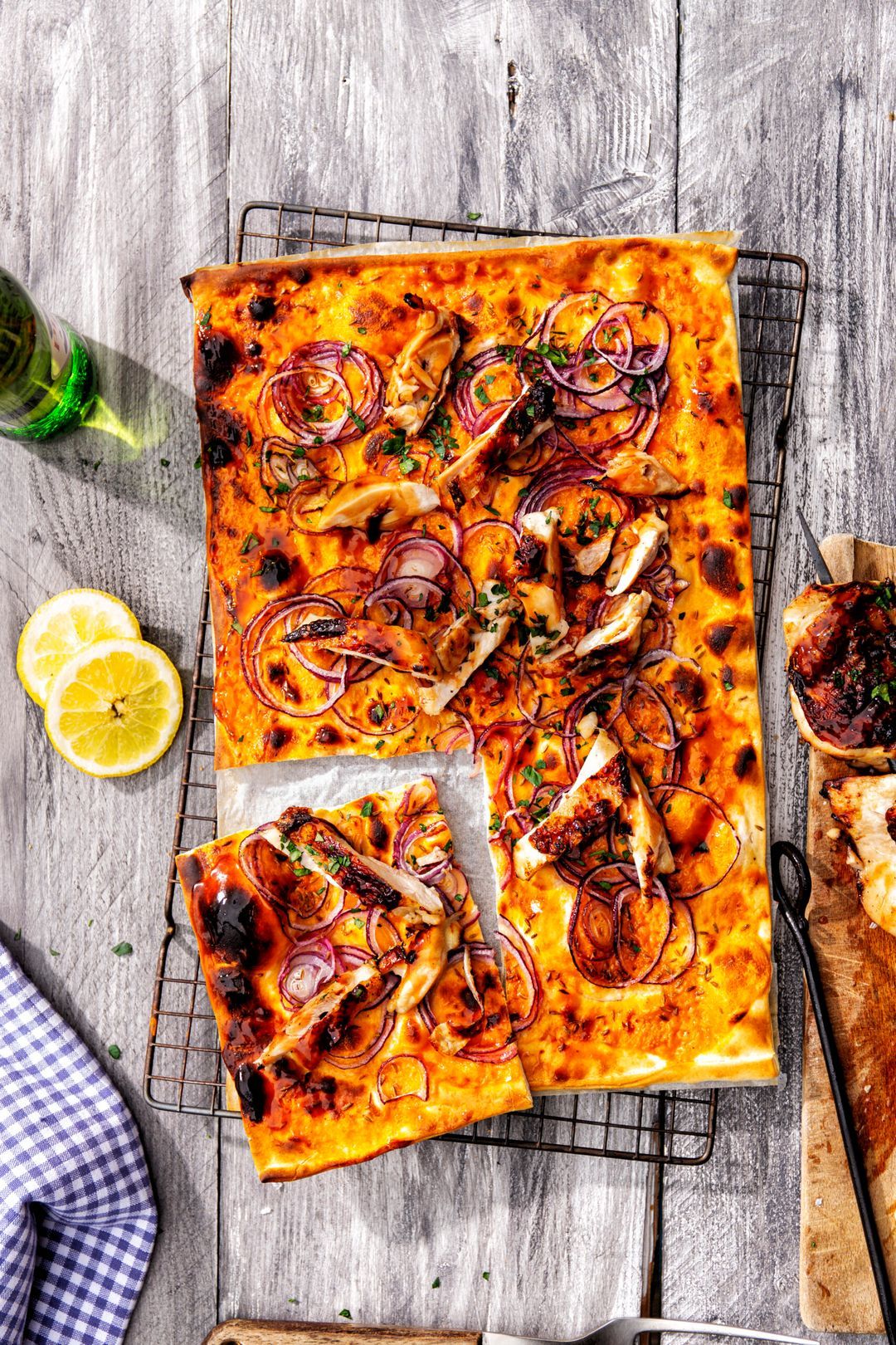 Flammkuchen with grilled spicy chicken, red onion and cumin