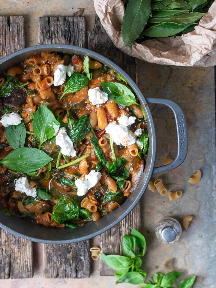 Pasta dish with eggplant, spinach and ricotta
