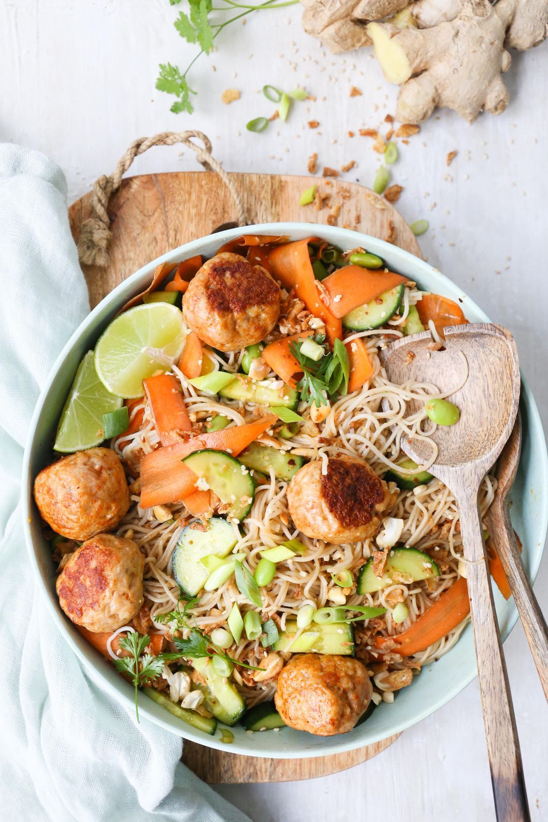 Noodle salad with cucumber, carrot and spicy chicken balls