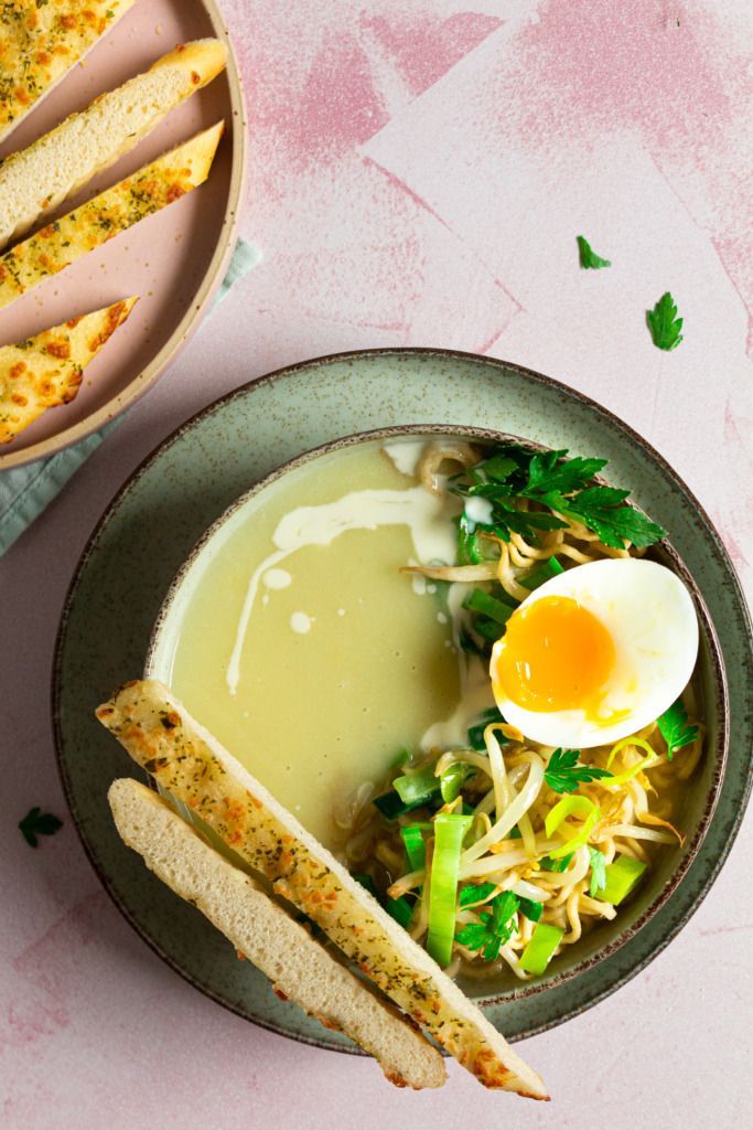 Meal soup of asparagus peels with noodles and egg