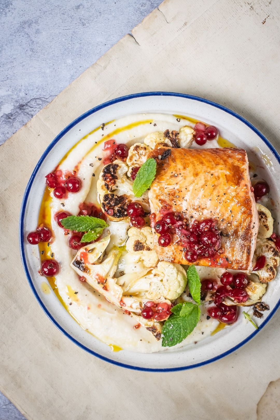 Cauliflower puree, salmon and red berries