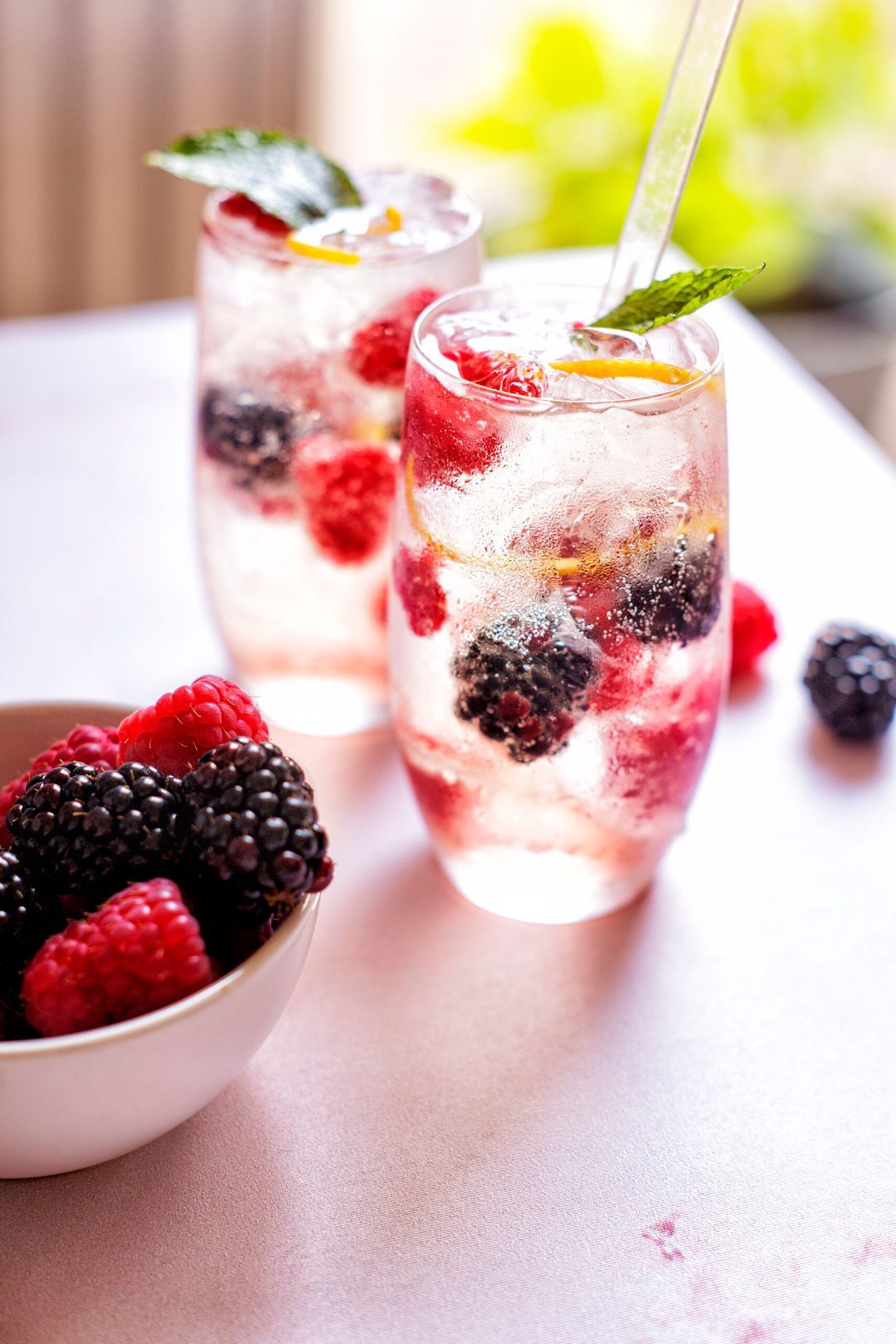 Champagne cocktail with blackberries and orange liqueur