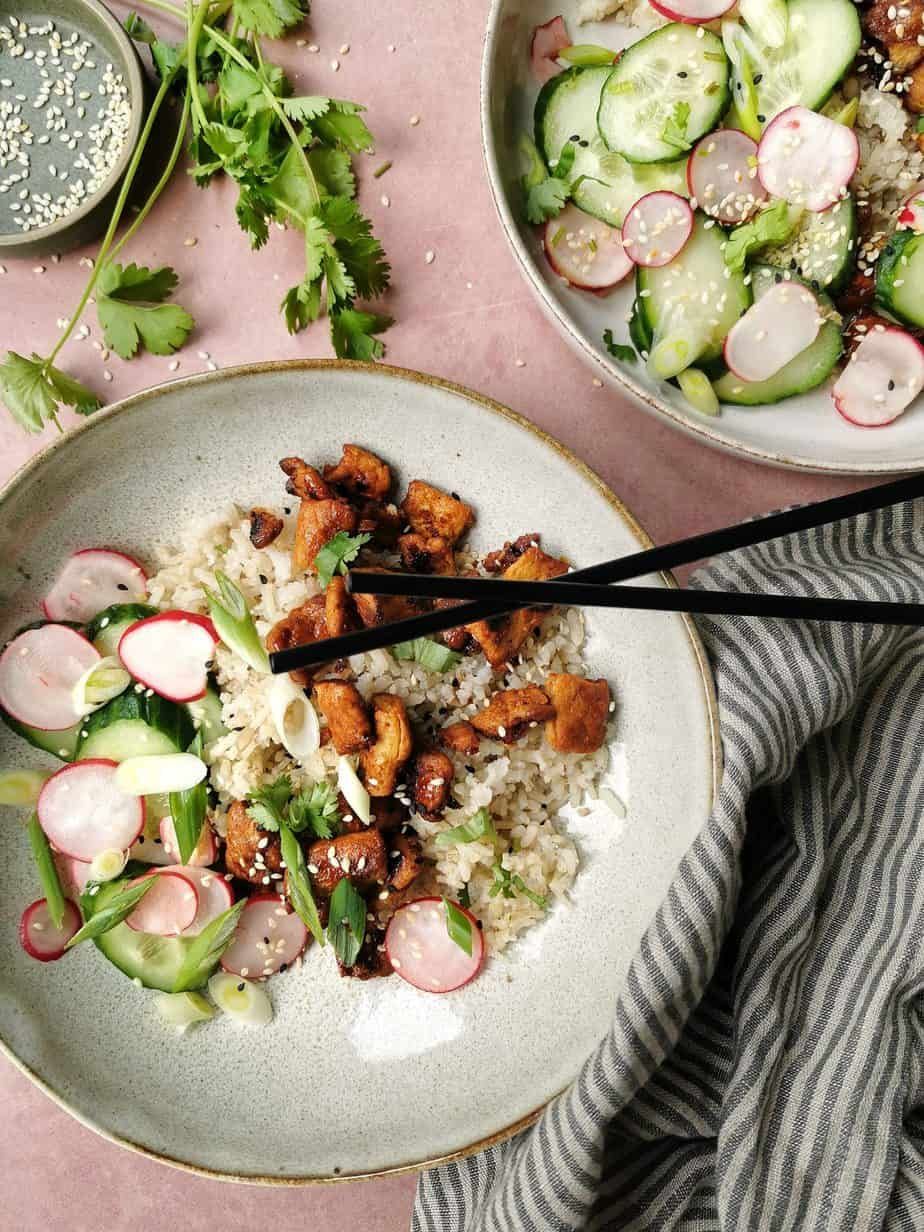 Asian vegetarian chicken with rice and cucumber-radish salad