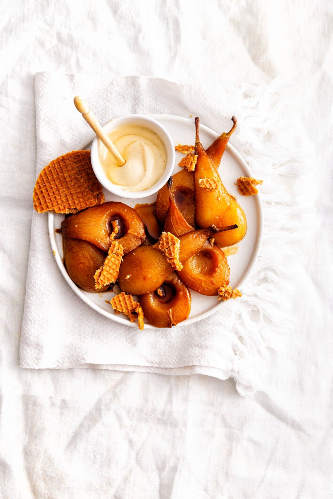 Roasted pears with apple syrup and vanilla cream
