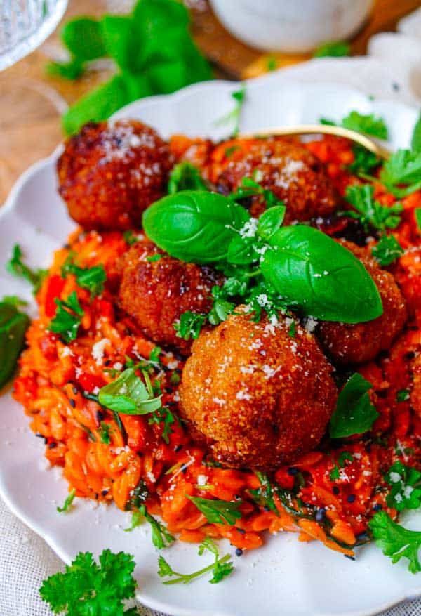 Orzo with tomato sauce and meatballs