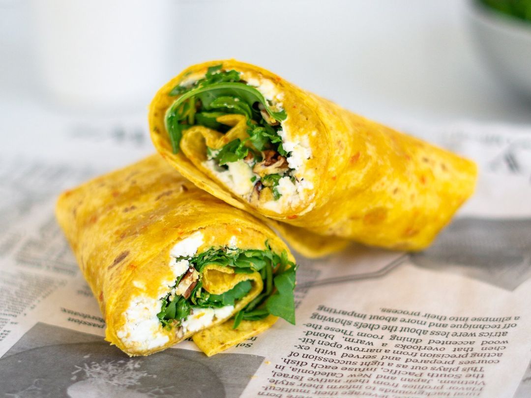 Autumn wrap with pumpkin hummus and feta