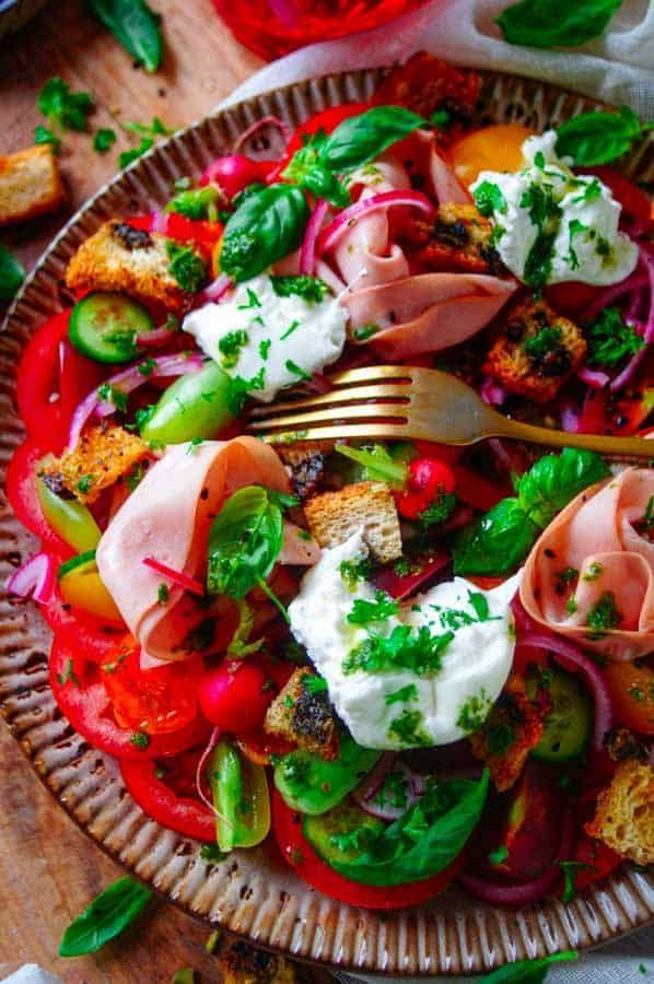 Tomato carpaccio with peach, burrata and oregano pesto