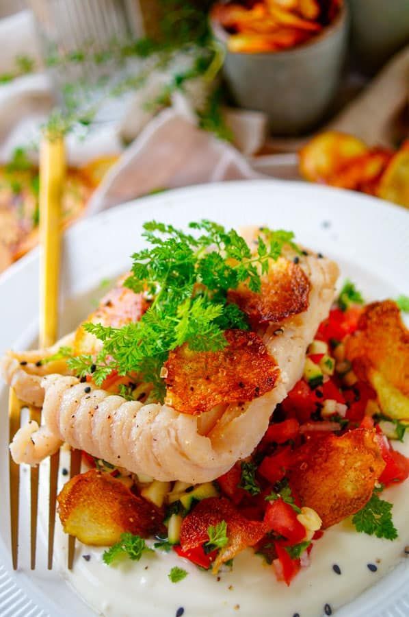 Poached ray wing with vegetable salsa