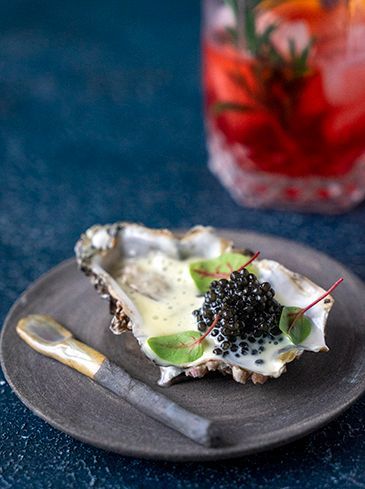Oyster with white chocolate and caviar