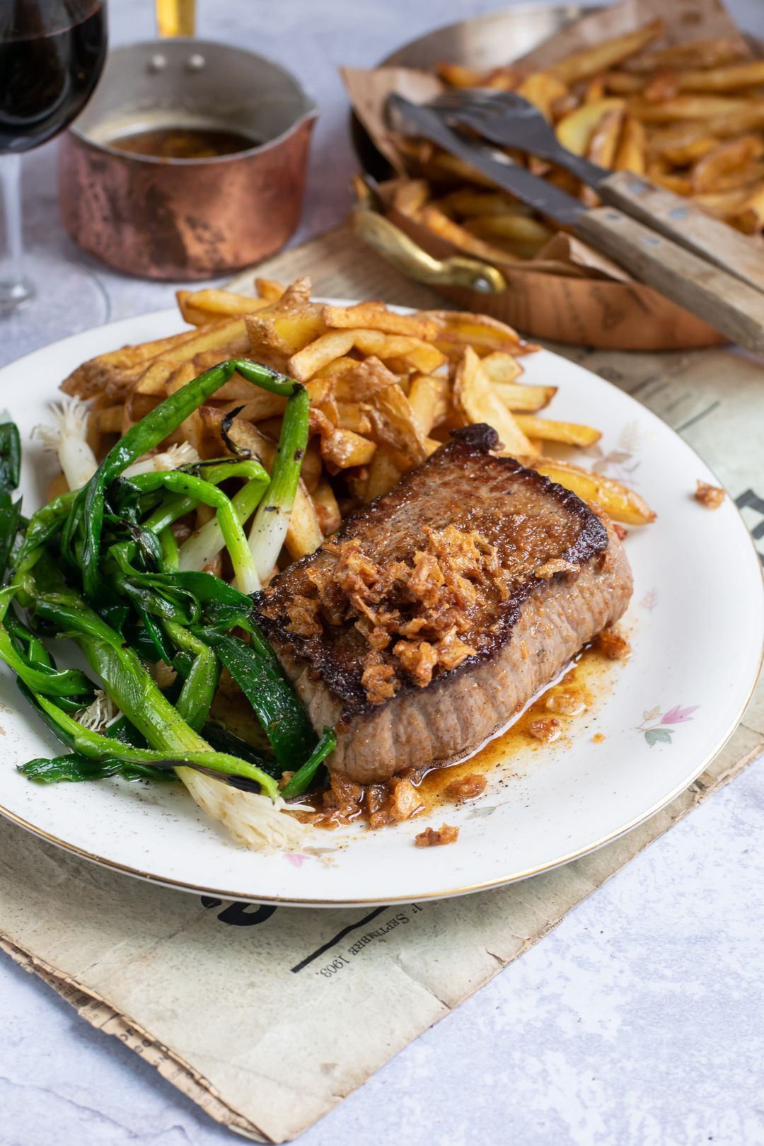 Chateaubriand with miso butter sauce, spring onion and fries.