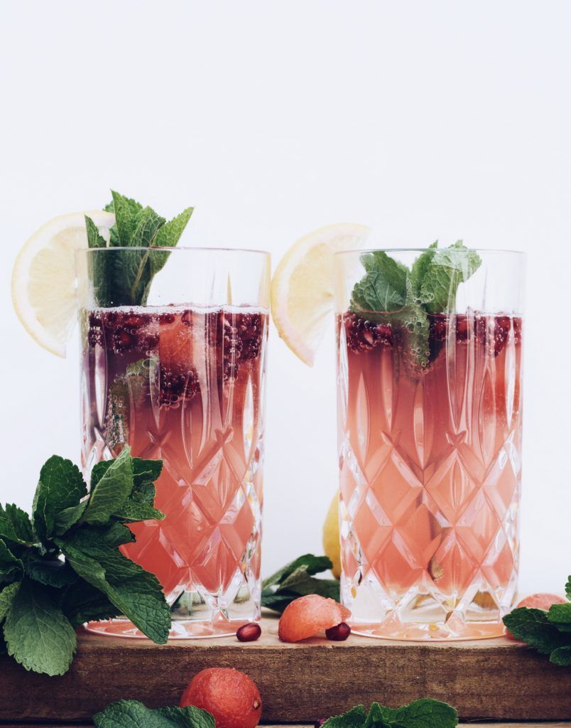 Pomegranate mocktail with mint, lemon and watermelon ice cubes