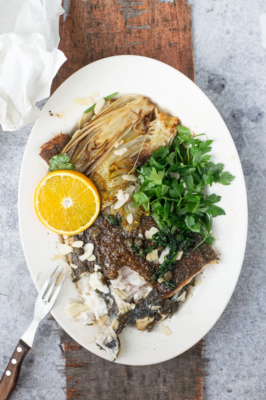 Plaice with orange, chicory and almonds