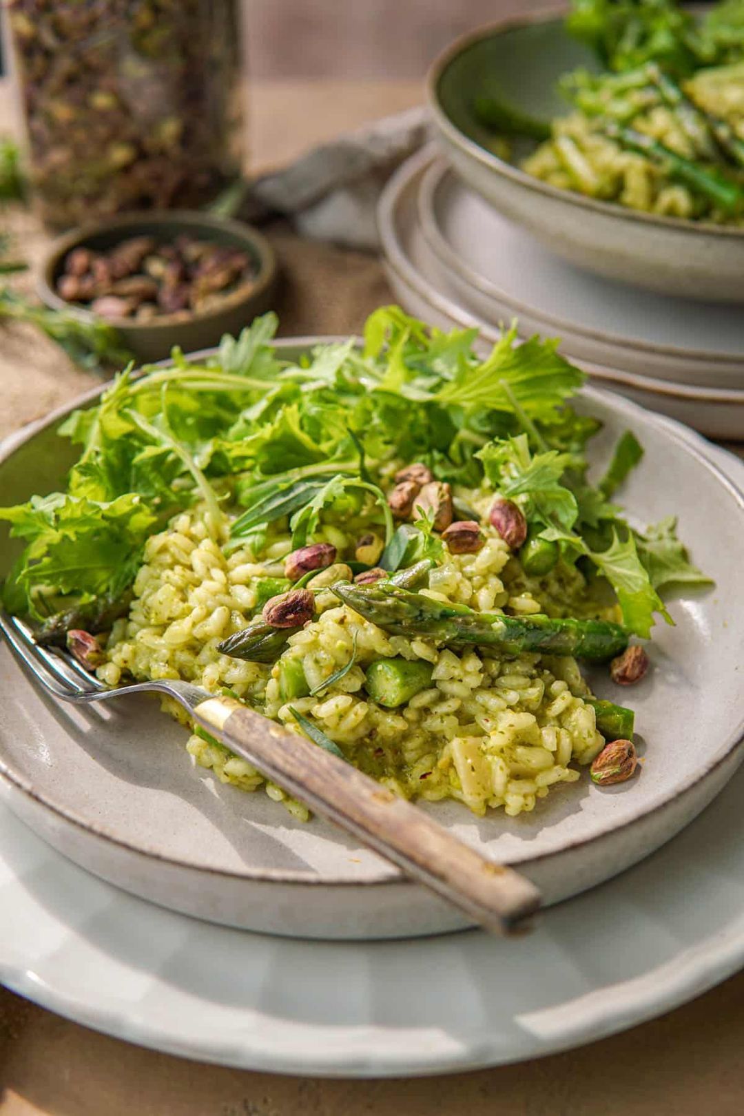 Risotto with green asparagus and pesto of turnip greens