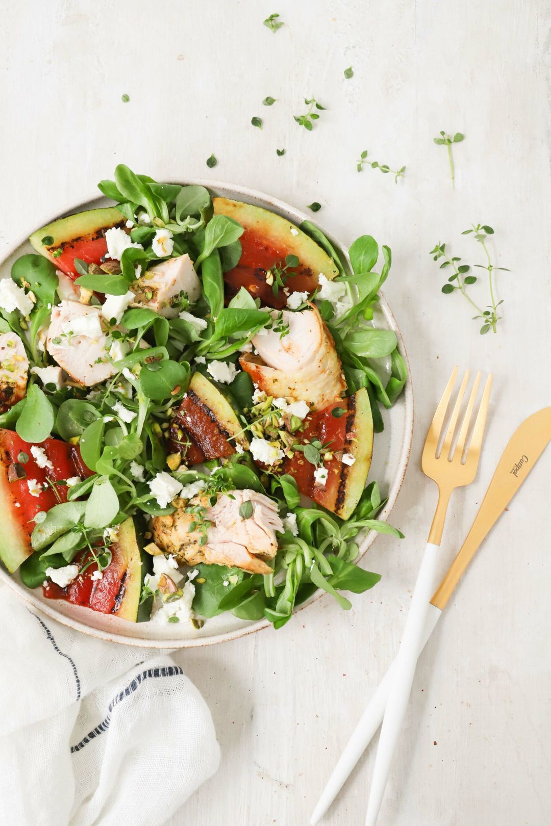 Salad with grilled watermelon and lemon thyme chicken