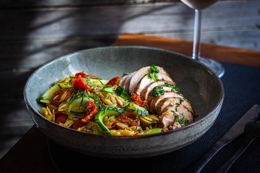 Smoked chicken breast with basil butter and Orzo