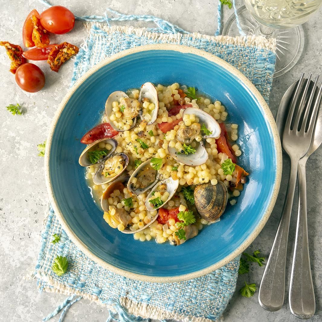 Sardinian fregula soup with clams