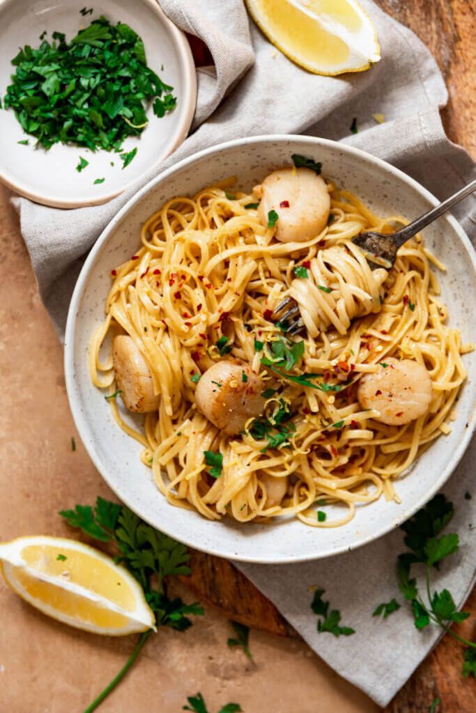 Spaghetti with scallops in a brown butter sauce