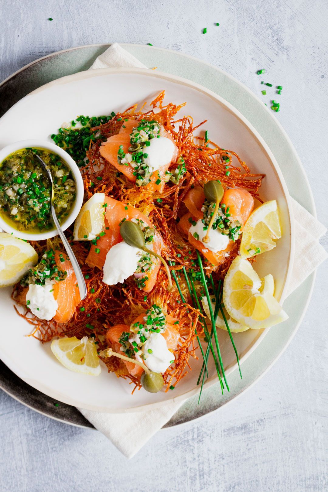 Rösti with smoked salmon, lemon cream and capers