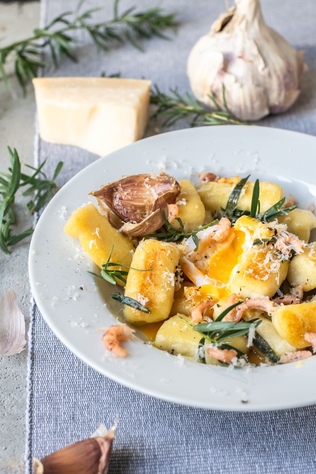 Gnocchi with shrimp, tarragon butter and an egg