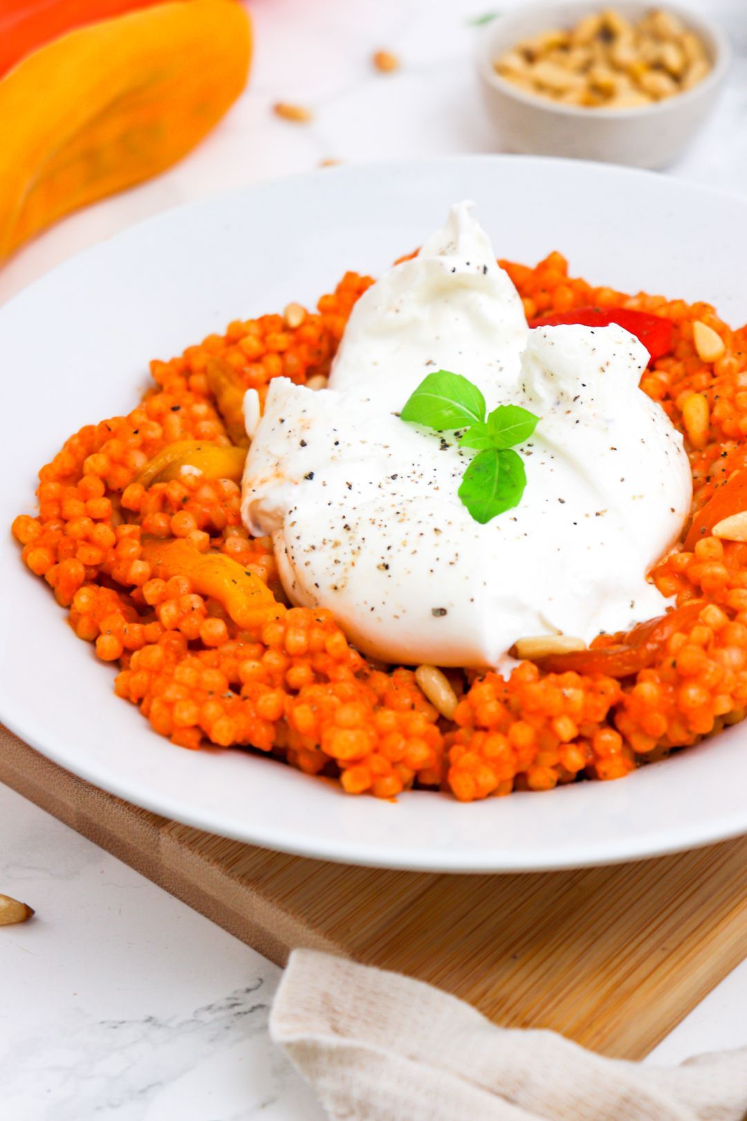 Creamy bell pepper and burrata pearls