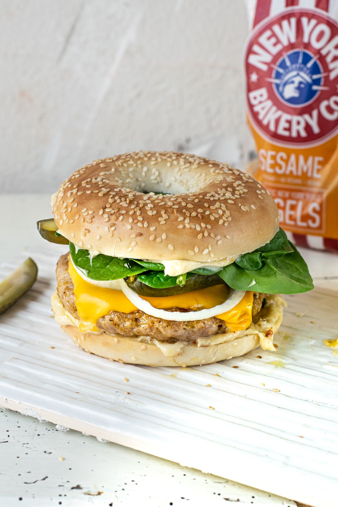 Bagel burger with chicken, cheddar, spinach and peanut mayonnaise