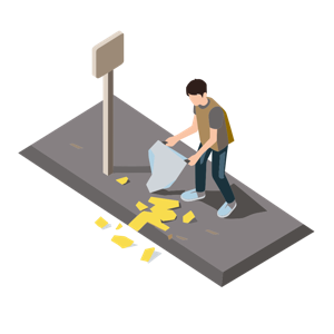 The image shows a man standing on the side of a road, holding a garbage bag in his hand. He is surrounded by a few pieces of paper scattered on the ground and a pole with a board attached to it.